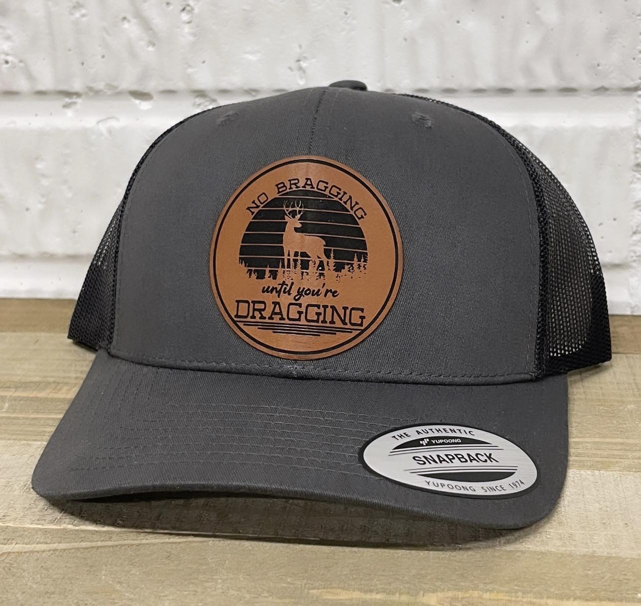 No Bragging Until You're Dragging Snapback Trucker Hat